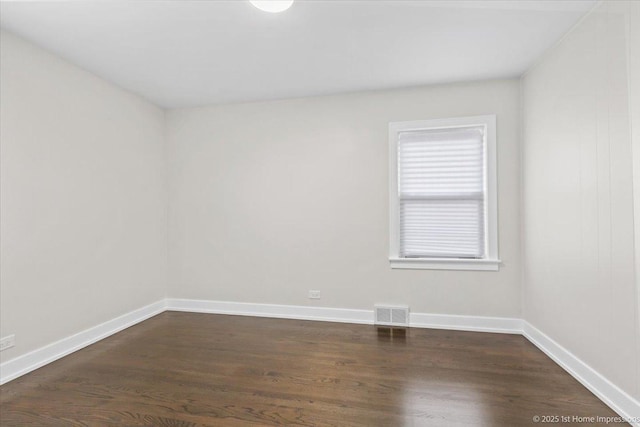 2552 W 117th Pl, Chicago, IL 60655 - unfurnished room with dark wood-style floors