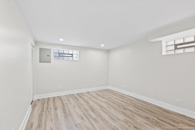 2552 W 117th Pl, Chicago, IL 60655 - basement featuring electric panel, light wood-style flooring, and recessed lighting