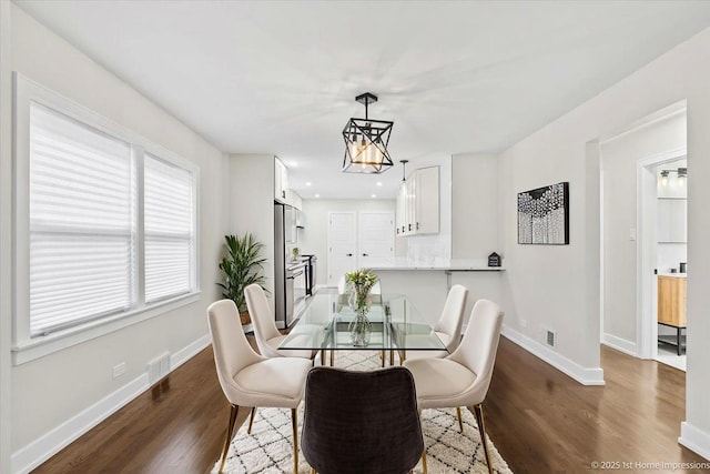 2552 W 117th Pl, Chicago, IL 60655 - dining space featuring dark wood-type flooring, recessed lighting, and a chandelier