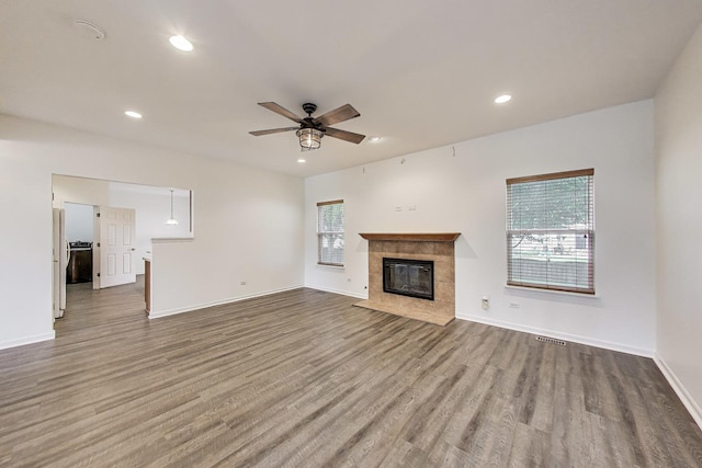 31692 N Clearwater Dr, Lakemoor, IL 60051 - unfurnished living room with healthy amount of natural light, wood finished floors, ceiling fan, and recessed lighting