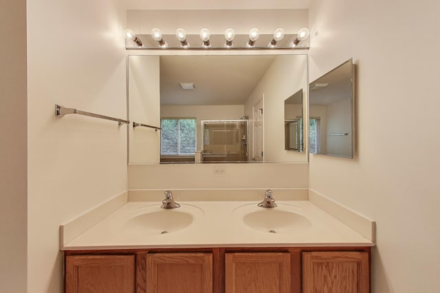 31692 N Clearwater Dr, Lakemoor, IL 60051 - bathroom with double vanity and a shower