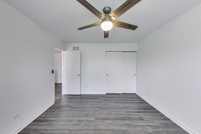 31692 N Clearwater Dr, Lakemoor, IL 60051 - unfurnished bedroom featuring wood finished floors, a closet, and a ceiling fan