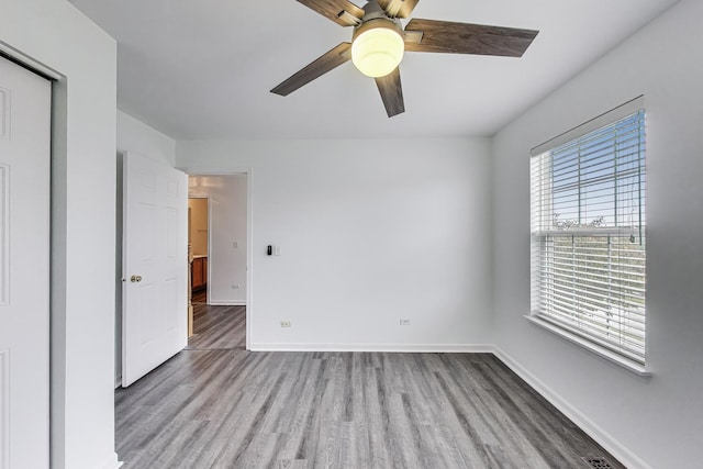 31692 N Clearwater Dr, Lakemoor, IL 60051 - unfurnished bedroom featuring wood finished floors and ceiling fan
