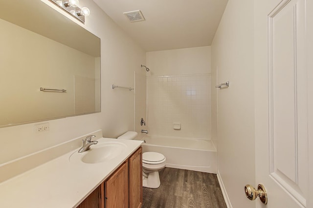 31692 N Clearwater Dr, Lakemoor, IL 60051 - full bath featuring wood finished floors, vanity, and washtub / shower combination