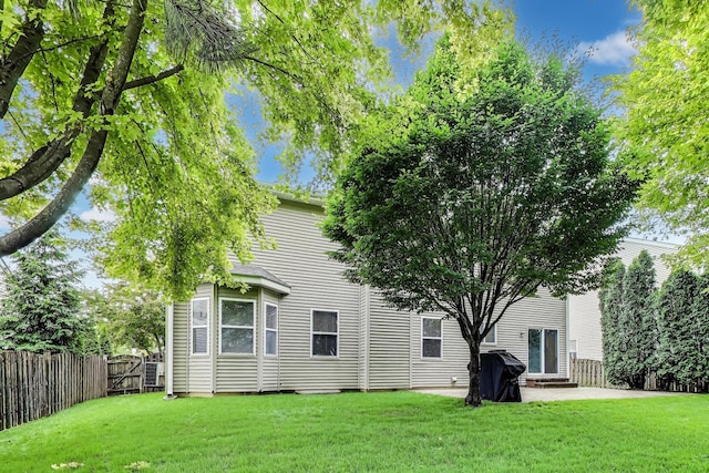 31692 N Clearwater Dr, Lakemoor, IL 60051 - back of property with a patio and a gate