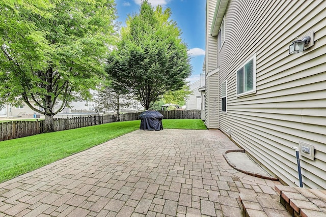 31692 N Clearwater Dr, Lakemoor, IL 60051 - fenced backyard with a patio and a grill
