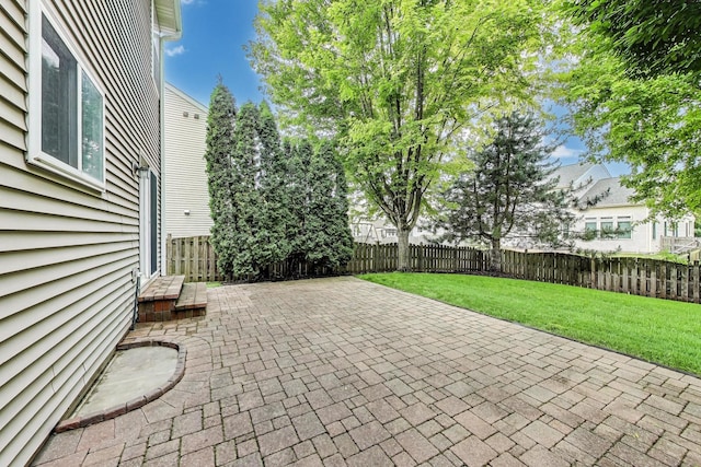 31692 N Clearwater Dr, Lakemoor, IL 60051 - fenced backyard with a patio area