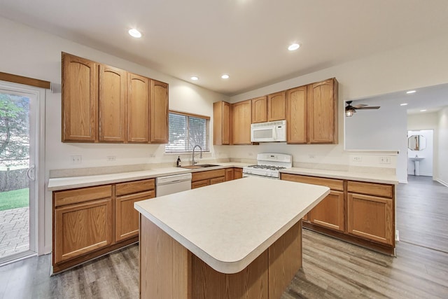 31692 N Clearwater Dr, Lakemoor, IL 60051 - kitchen featuring white appliances, wood finished floors, light countertops, and recessed lighting