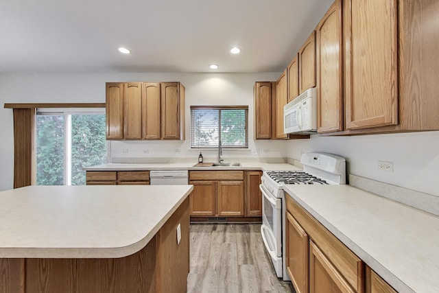 31692 N Clearwater Dr, Lakemoor, IL 60051 - kitchen with white appliances, light countertops, light wood-style flooring, and recessed lighting