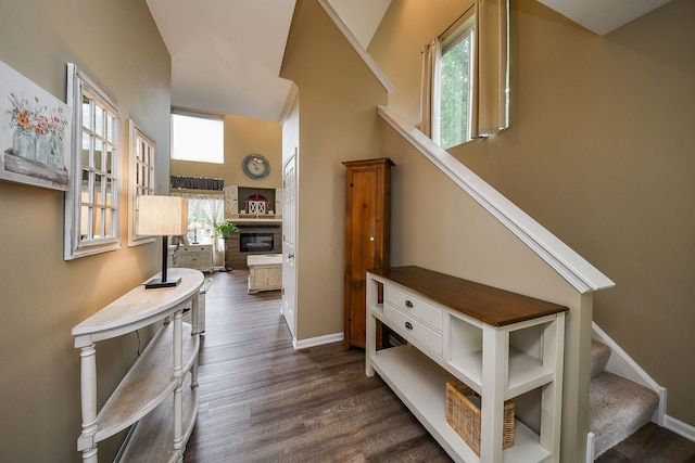 1934 Stoneheather Ave, Aurora, IL 60503 - stairway with a glass covered fireplace, healthy amount of natural light, and wood finished floors
