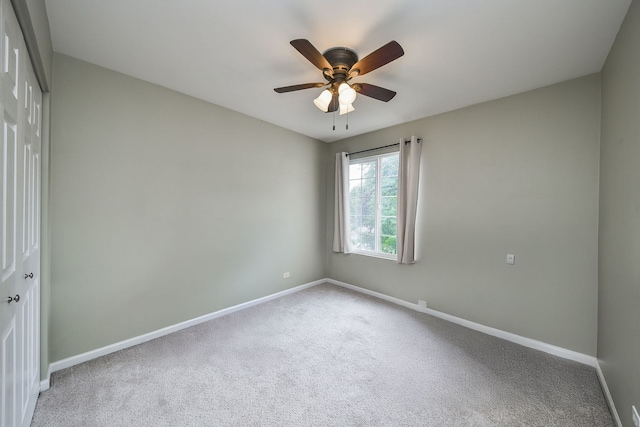 1934 Stoneheather Ave, Aurora, IL 60503 - carpeted spare room featuring baseboards and a ceiling fan