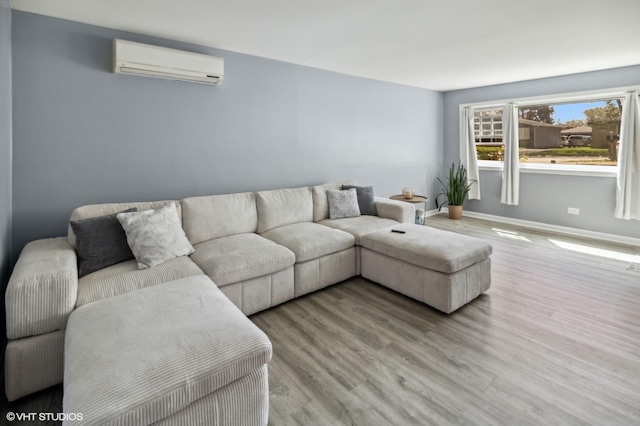 323 Marshall Rd, Bensenville, IL 60106 - living area with a wall mounted air conditioner and wood finished floors