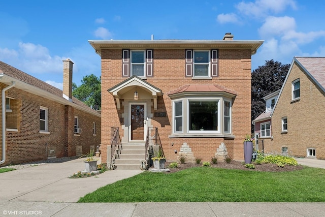 1820 N 75th Ct, Elmwood Park, IL 60707 - view of front of house featuring brick siding, a front yard, and a chimney