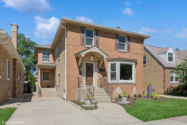 1820 N 75th Ct, Elmwood Park, IL 60707 - view of front of home featuring brick siding and concrete driveway
