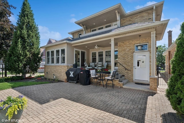 1820 N 75th Ct, Elmwood Park, IL 60707 - rear view of house featuring brick siding, ceiling fan, and a patio