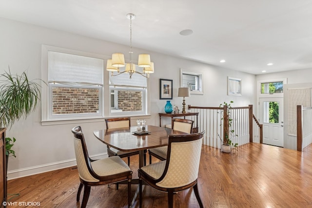 1820 N 75th Ct, Elmwood Park, IL 60707 - dining area featuring a chandelier, wood finished floors, and recessed lighting