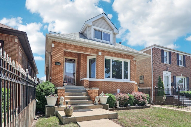 4517 N Austin Ave, Chicago, IL 60630 - bungalow-style home with brick siding and roof with shingles