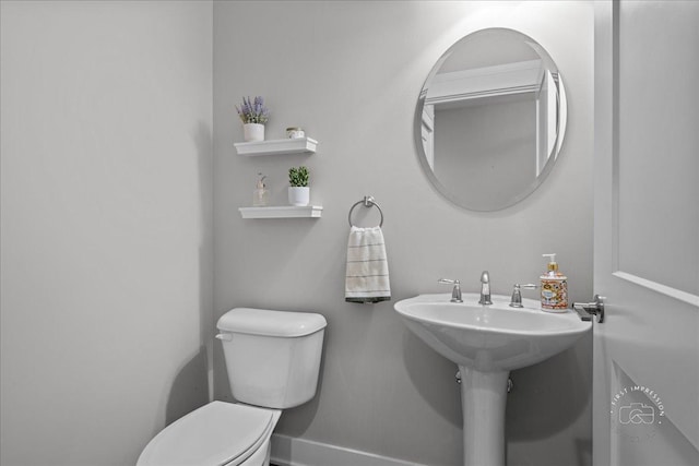 657 Bourbon Ct, Naperville, IL 60565 - bathroom with toilet and baseboards