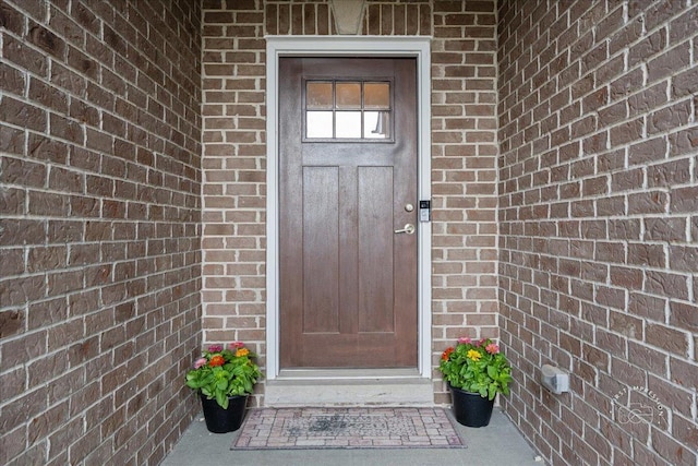 657 Bourbon Ct, Naperville, IL 60565 - doorway to property featuring brick siding