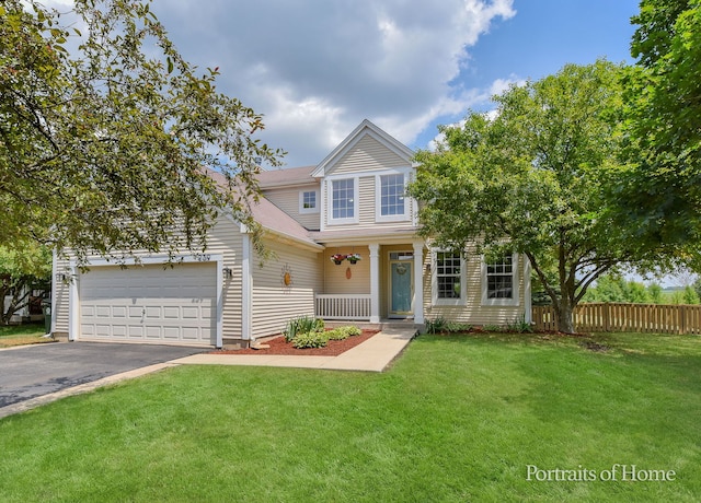 239 Morgan Valley Dr, Oswego, IL 60543 - traditional-style home featuring asphalt driveway, a porch, and an attached garage