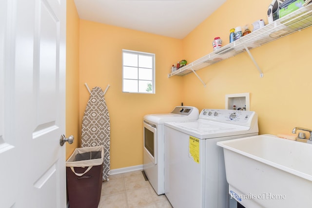 239 Morgan Valley Dr, Oswego, IL 60543 - laundry area with independent washer and dryer and light tile patterned flooring