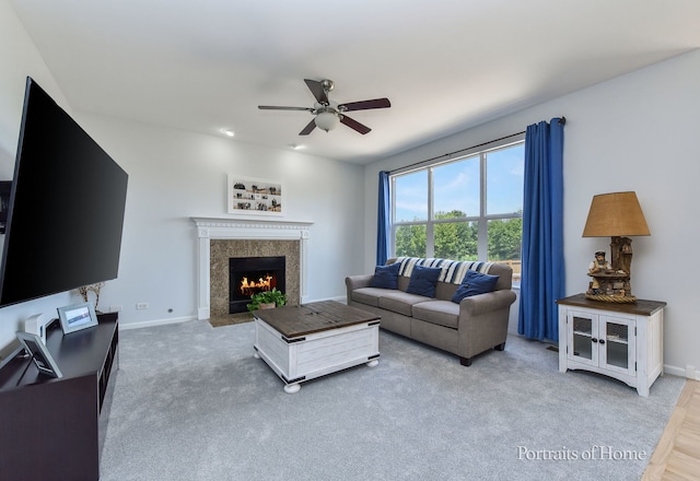 239 Morgan Valley Dr, Oswego, IL 60543 - living room featuring ceiling fan, a fireplace, and carpet