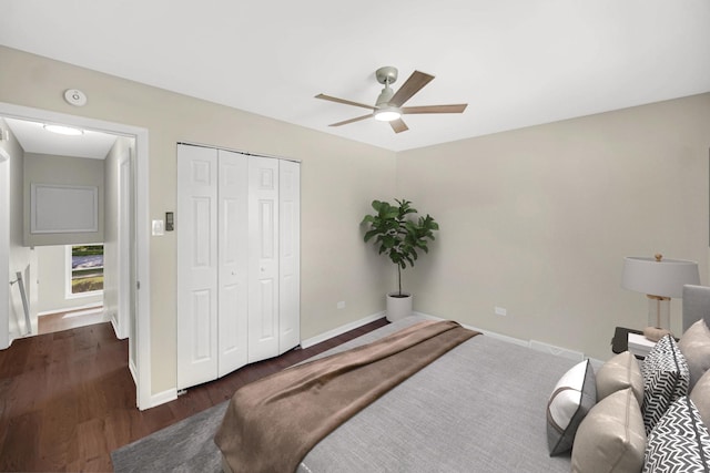 14112 S Hoxie Ave, Burnham, IL 60633 - bedroom with dark wood-type flooring, a closet, and ceiling fan