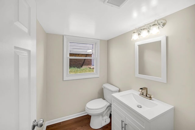 14112 S Hoxie Ave, Burnham, IL 60633 - bathroom with vanity and wood finished floors