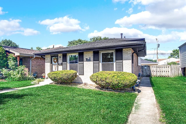 14112 S Hoxie Ave, Burnham, IL 60633 - view of front of house featuring brick siding and roof with shingles