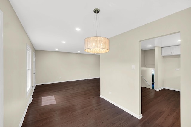 14112 S Hoxie Ave, Burnham, IL 60633 - empty room with dark wood-style flooring and recessed lighting