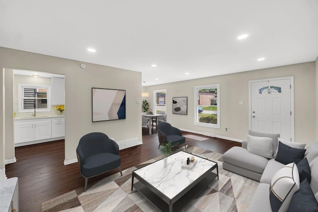 14112 S Hoxie Ave, Burnham, IL 60633 - living room featuring dark wood-style floors and recessed lighting