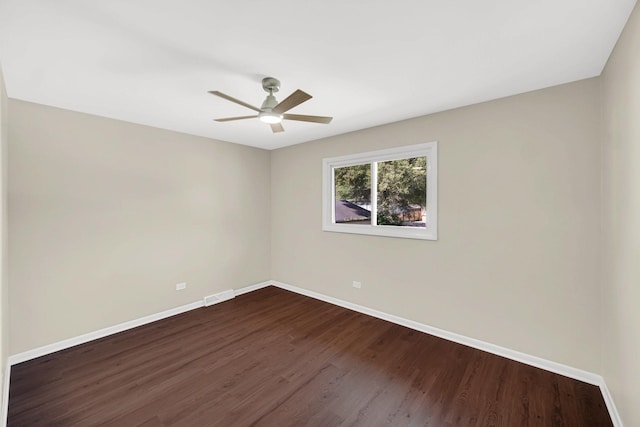 14112 S Hoxie Ave, Burnham, IL 60633 - unfurnished room featuring dark wood-type flooring and ceiling fan