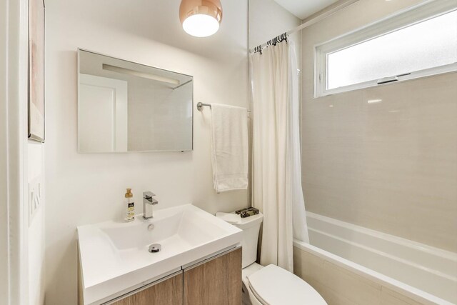 2423 W Erie St, Chicago, IL 60612 - bathroom with vanity and shower / tub combo with curtain