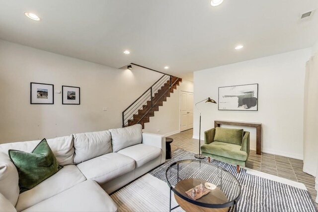 2423 W Erie St, Chicago, IL 60612 - living room featuring stairs and recessed lighting