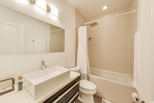 2423 W Erie St, Chicago, IL 60612 - full bath with shower / bath combination with curtain, vanity, and recessed lighting