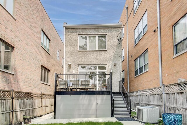 2423 W Erie St, Chicago, IL 60612 - back of property featuring brick siding and stairs
