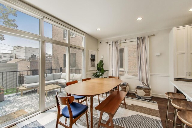 2423 W Erie St, Chicago, IL 60612 - dining space featuring healthy amount of natural light, wood finished floors, and recessed lighting