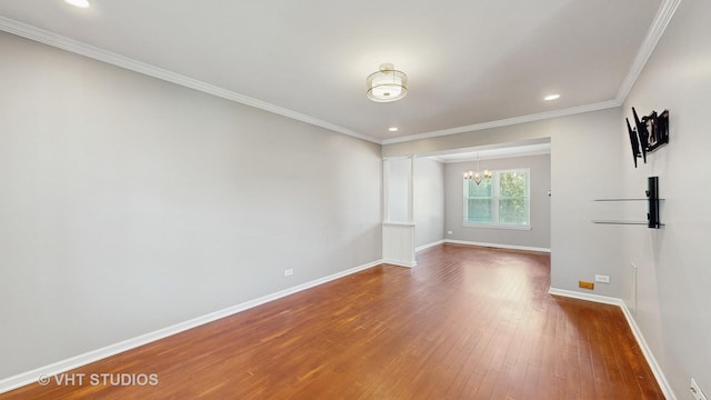228 Dunton Ct, Mundelein, IL 60060 - spare room with a chandelier, dark wood-style floors, recessed lighting, and crown molding