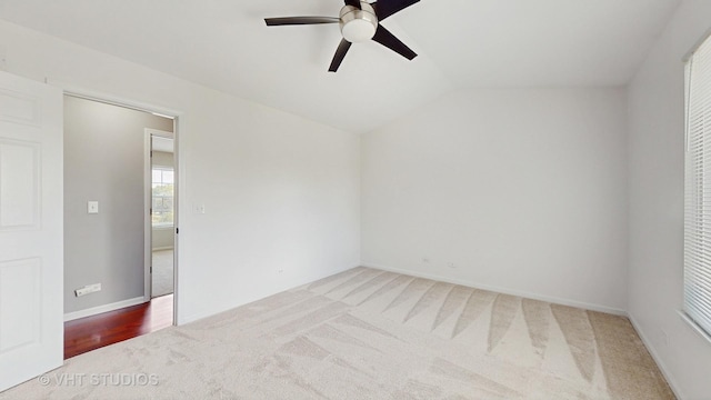 228 Dunton Ct, Mundelein, IL 60060 - spare room featuring ceiling fan, carpet flooring, and vaulted ceiling