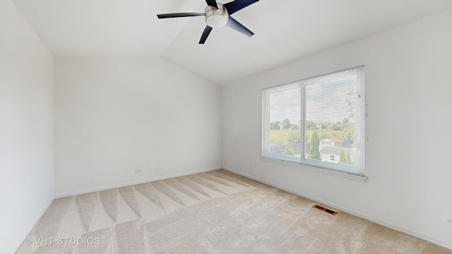 228 Dunton Ct, Mundelein, IL 60060 - empty room with carpet, a ceiling fan, and vaulted ceiling