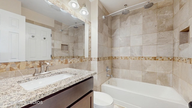 228 Dunton Ct, Mundelein, IL 60060 - full bathroom with tile walls, vanity, and a combined bath / shower with rainfall shower
