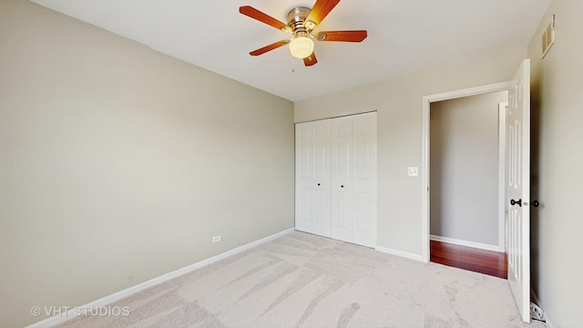 228 Dunton Ct, Mundelein, IL 60060 - unfurnished bedroom with light carpet, a closet, and ceiling fan