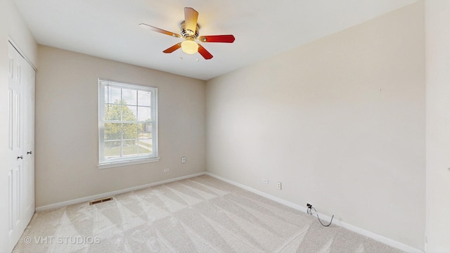 228 Dunton Ct, Mundelein, IL 60060 - empty room with light colored carpet and a ceiling fan