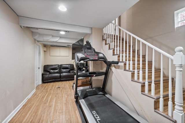 2837 W Coyle Ave, Chicago, IL 60645 - workout area with wood finished floors and baseboards