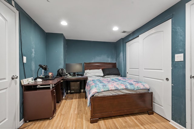 2837 W Coyle Ave, Chicago, IL 60645 - bedroom with wood finished floors and recessed lighting