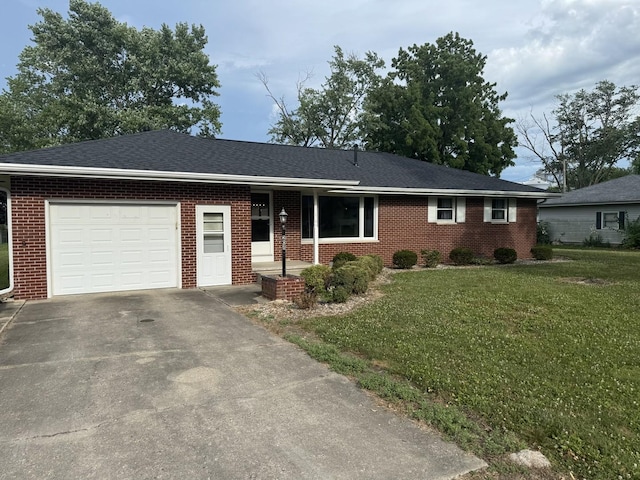 208 N Wisconsin St, Atwood, IL 61913 - single story home featuring an attached garage, brick siding, and concrete driveway