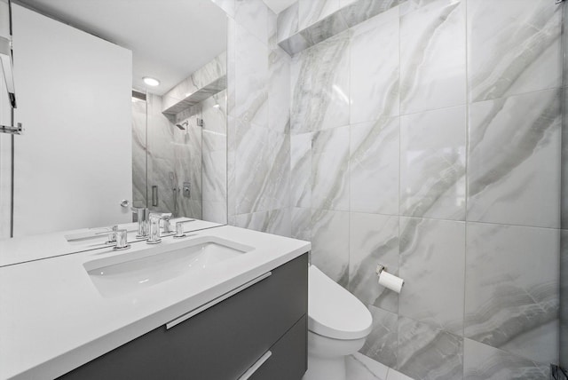 330 W Diversey Pkwy Unit 1606, Chicago, IL 60657 - bathroom featuring vanity, a marble finish shower, and tile walls