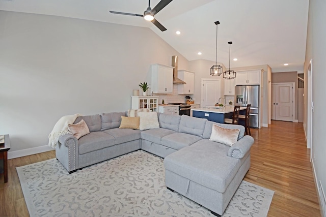 1723 Glenbridge Rd, Bloomington, IL 61704 - living area featuring ceiling fan, light wood-style flooring, recessed lighting, and high vaulted ceiling