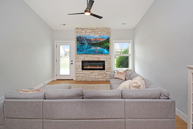 1723 Glenbridge Rd, Bloomington, IL 61704 - living area with ceiling fan, a fireplace, wood finished floors, and lofted ceiling