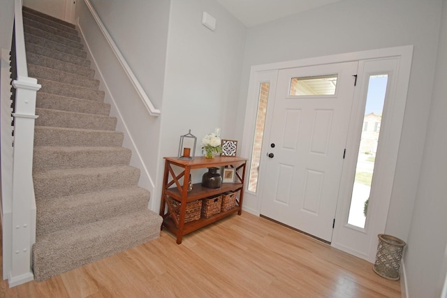 1723 Glenbridge Rd, Bloomington, IL 61704 - foyer entrance with light wood-style floors and stairway